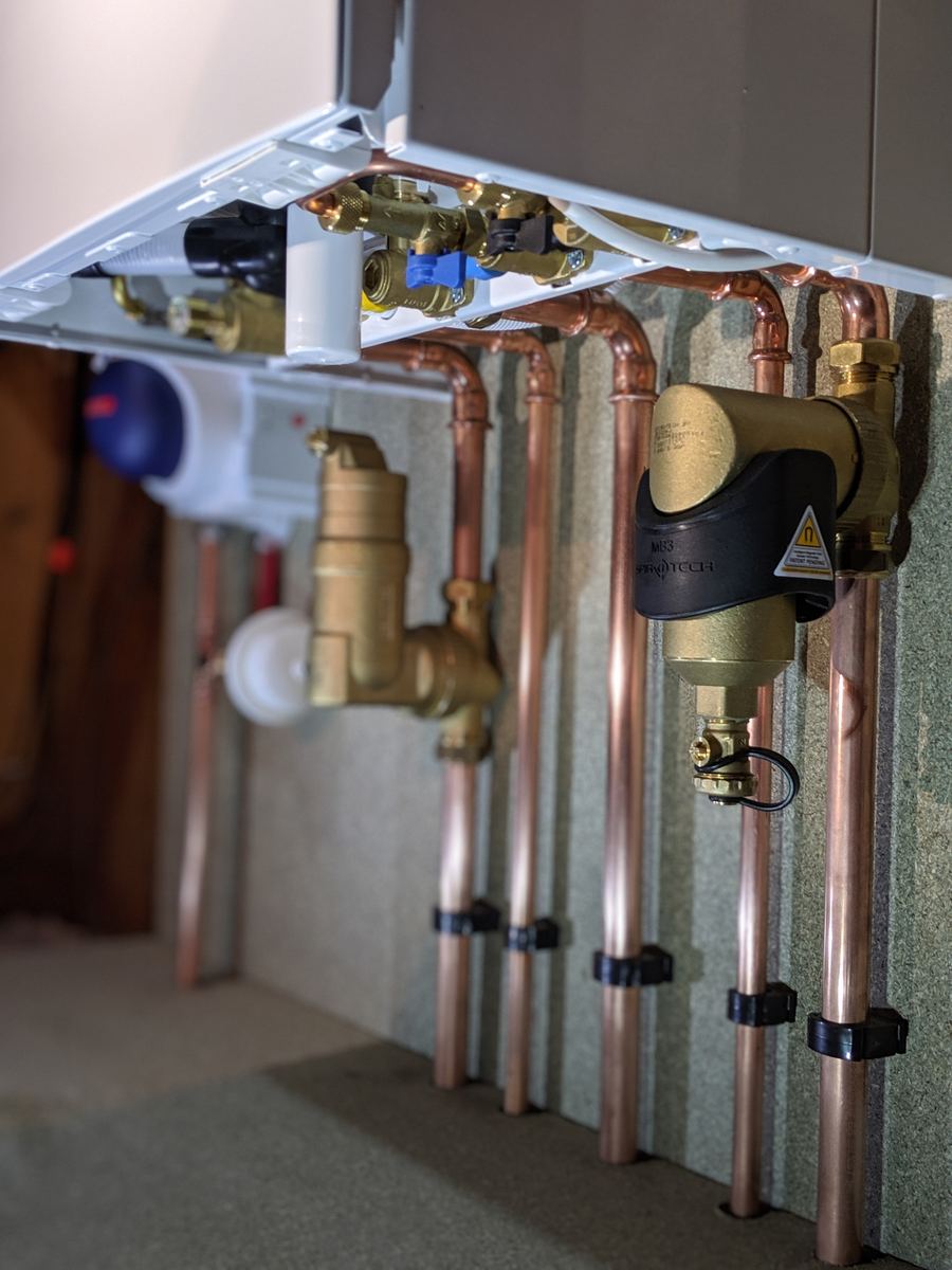 Close-up of neat copper pipework and valves